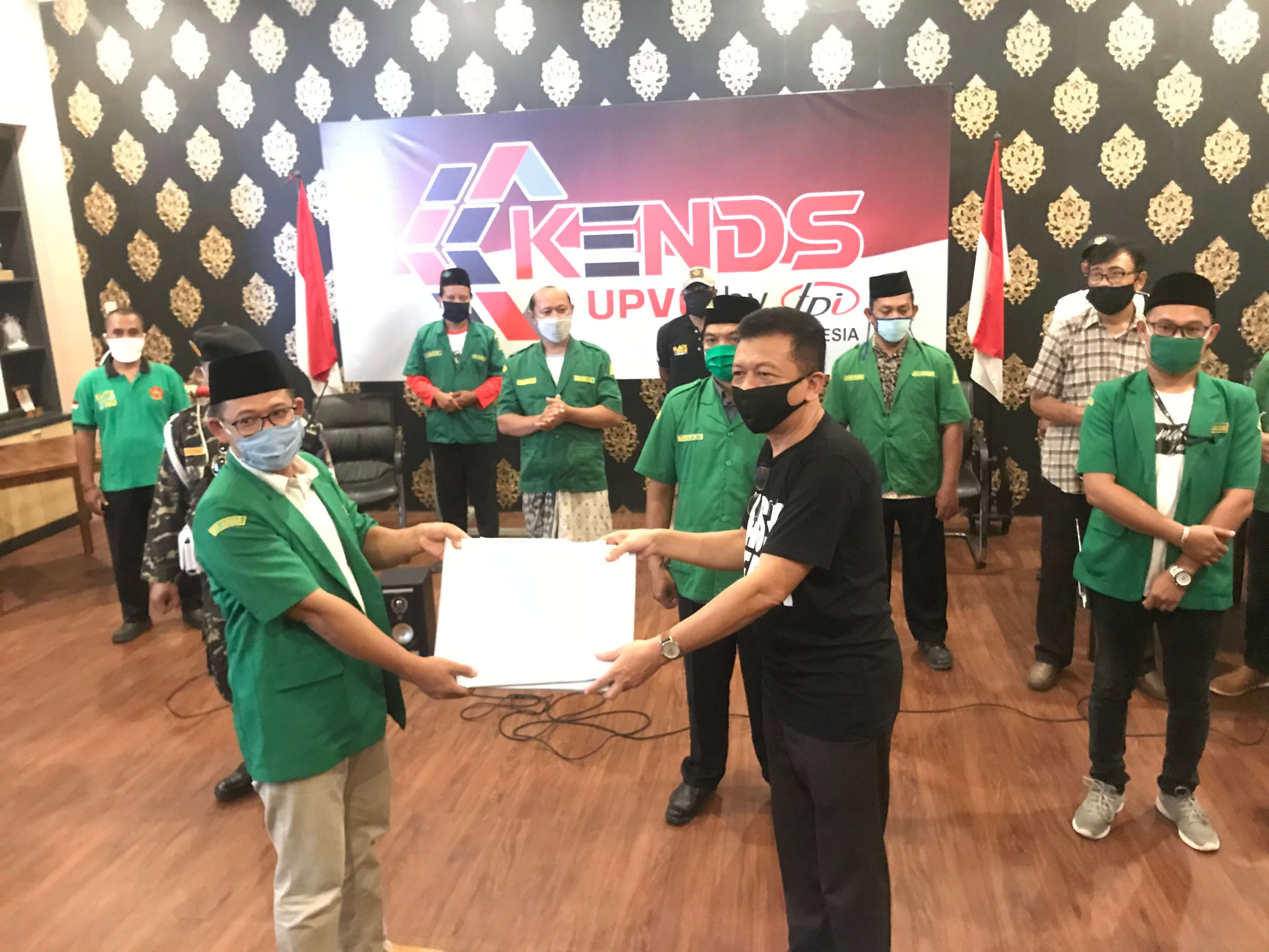 Lawan Corona, PT TPI Bersama PWI Dan GP Ansor Bagikan Masker